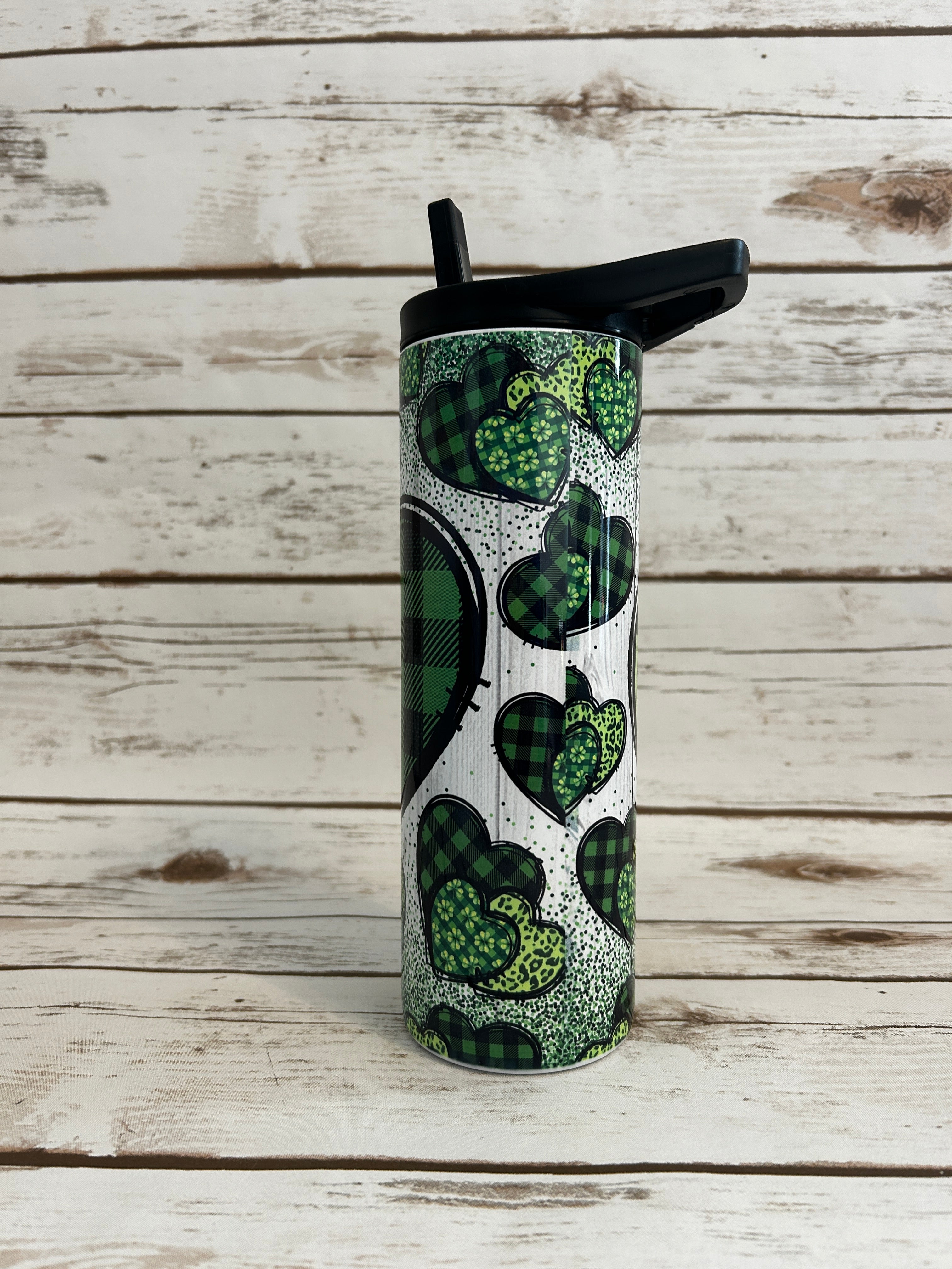 20 oz Skinny Gorgeous Green Hearts shown with bladk flip lid