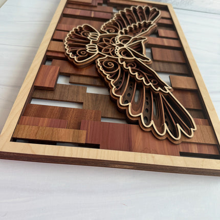 Wooden wall art with a flying owl design, top shot to show detail of the 5 layers. 