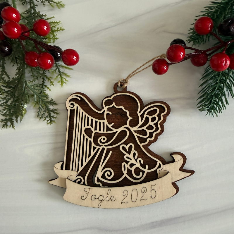 Wooden angel ornament with harp with personalization that is engraved by Cactus Air Designs.