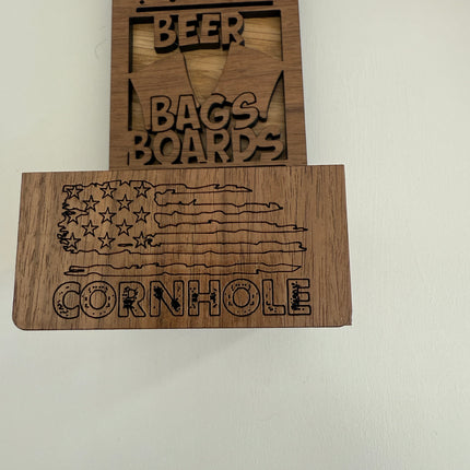 Close up View of Catcher of Beer, Bags Boards Bottle Opener with Catcher shaped as Beer Bottle 
