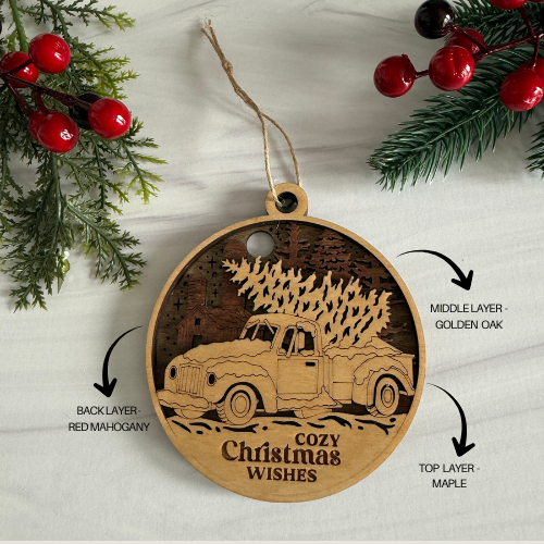 Wooden Christmas ornament with truck design, layered wood finish, and 'Cozy Christmas Wishes' text.