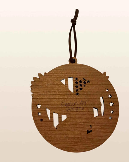 Back of American eagle flag USA 250th anniversary wood ornament showing cherry plywood layer and Cactus Air Designs branding