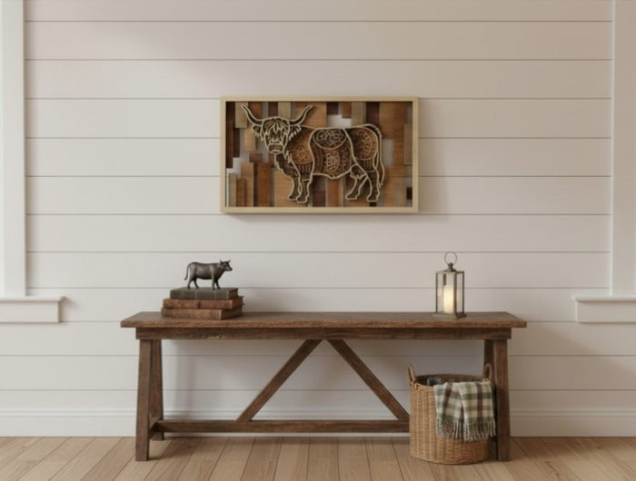 Wooden bench in a room with a framed picture of two animals on the wall.