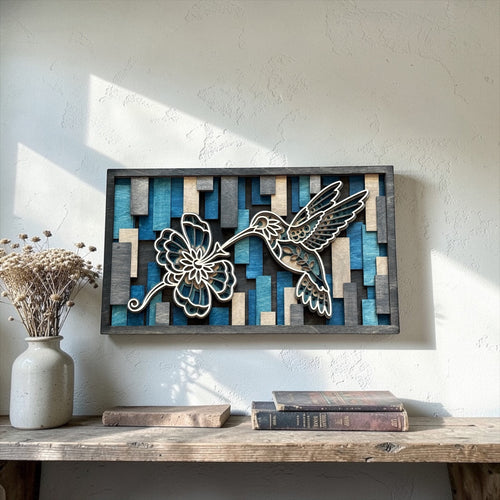 Cactus Air Designs layered wood wall art featuring a hummingbird with a blue geometric floral design.