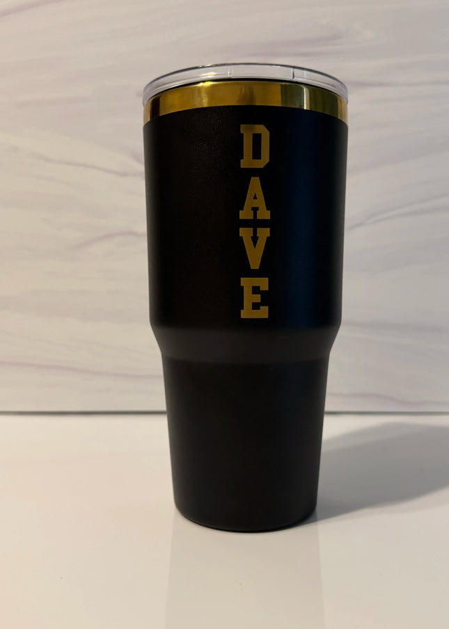 Black and gold electroplated 30 oz tumbler personalized with the name DAVE in vertical stacked letters, laser engraved by Cactus Air Designs

