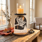 Wooden candle holder with sparrow design and 'Woodland Wishes' text on a wooden table by a window by Cactus Air Designs.