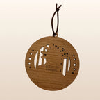 Back of USA 250th Anniversary Statue of Liberty ornament showing Cactus Air Designs maker's mark on Premium Cherry plywood with leather cord hanger