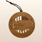 Back of USA 250th Anniversary USA Map ornament showing Cactus Air Designs maker's mark on Premium Cherry plywood with leather cord hanger
