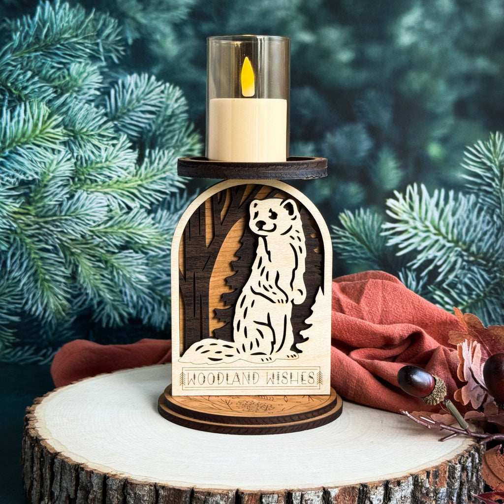 Wooden candle holder with a badger design against a tree background