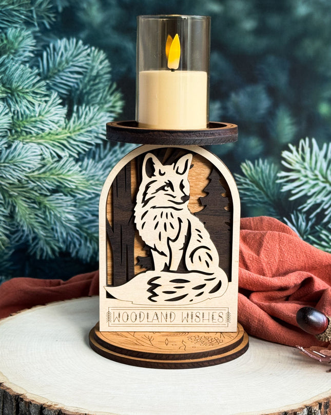 Decorative candle holder with a fox design on a wooden base, against a natural background.