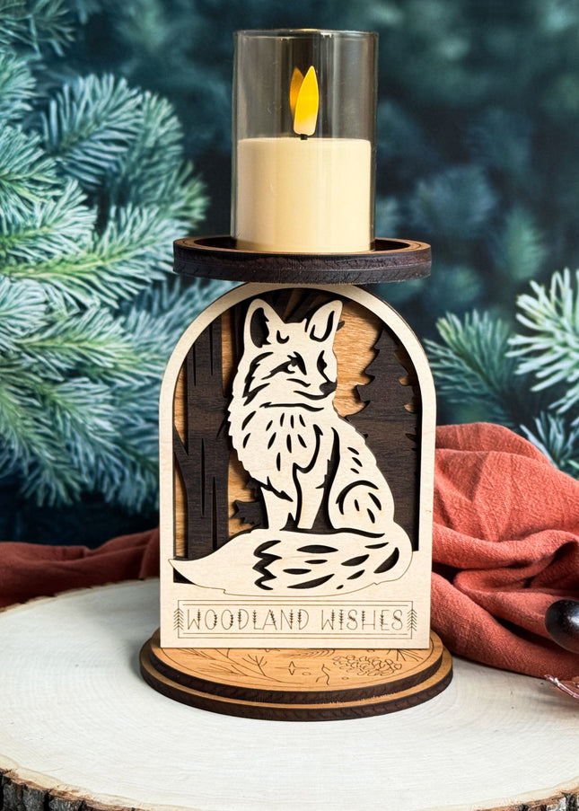 Decorative candle holder with a fox design on a wooden base, against a natural background.