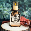 Decorative candle holder with a skunk design on a wooden base, against a green foliage background.