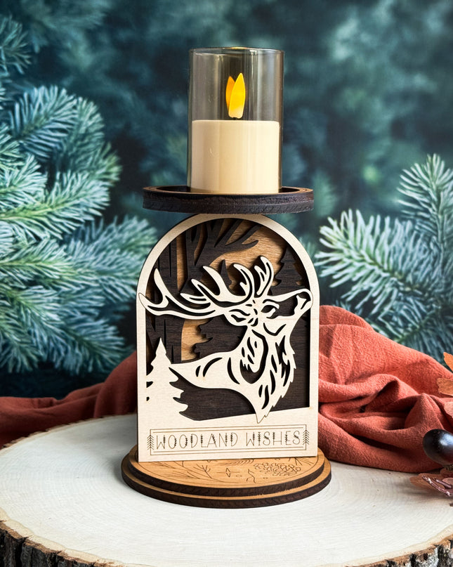Wooden candle holder with deer design against a forest background