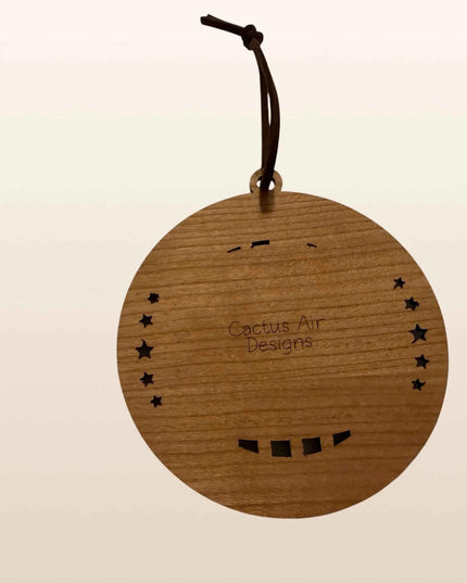 Back of Cheeseburger USA 250th anniversary wood ornament showing cherry plywood layer and Cactus Air Designs branding
