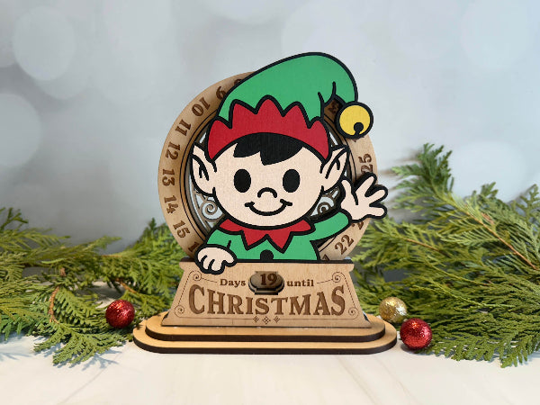 Laser-cut elf character wooden Christmas countdown with engraved numbers.