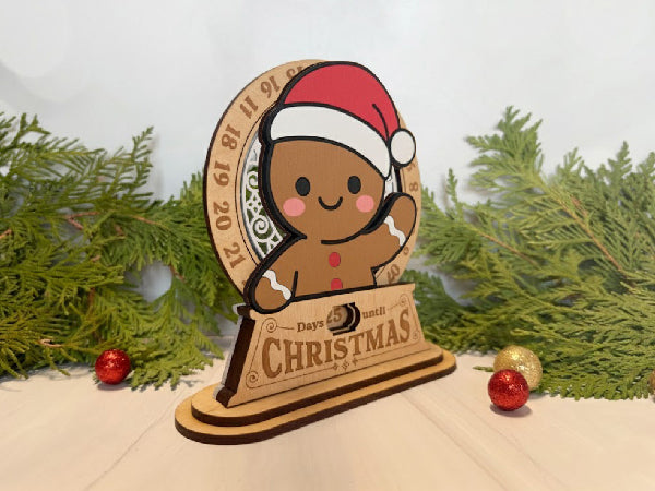 Wooden gingerbread man  with a Santa hat on a countdown stand, surrounded by Christmas decorations.