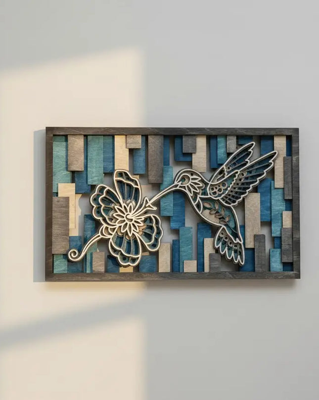 Hummingbird layered wood wall art in blue tones, open back style 
showing depth and dimension through slats, handcrafted by Cactus 
Air Designs