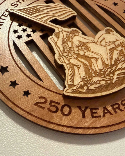 Detail view of Iwo Jima Flag Raising 250 Years of Freedom laser cut wood ornament showing soldiers raising American flag silhouette