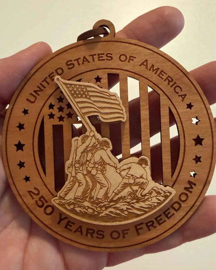 Scale view of Iwo Jima Flag Raising 250 Years of Freedom laser cut wood ornament showing soldiers raising American flag silhouette