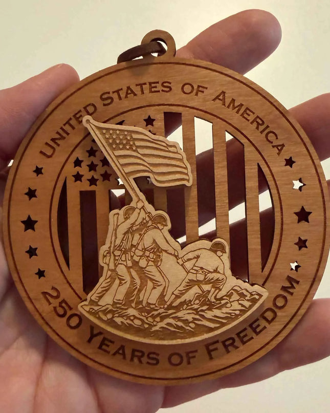 Scale view of Iwo Jima Flag Raising 250 Years of Freedom laser cut wood ornament showing soldiers raising American flag silhouette