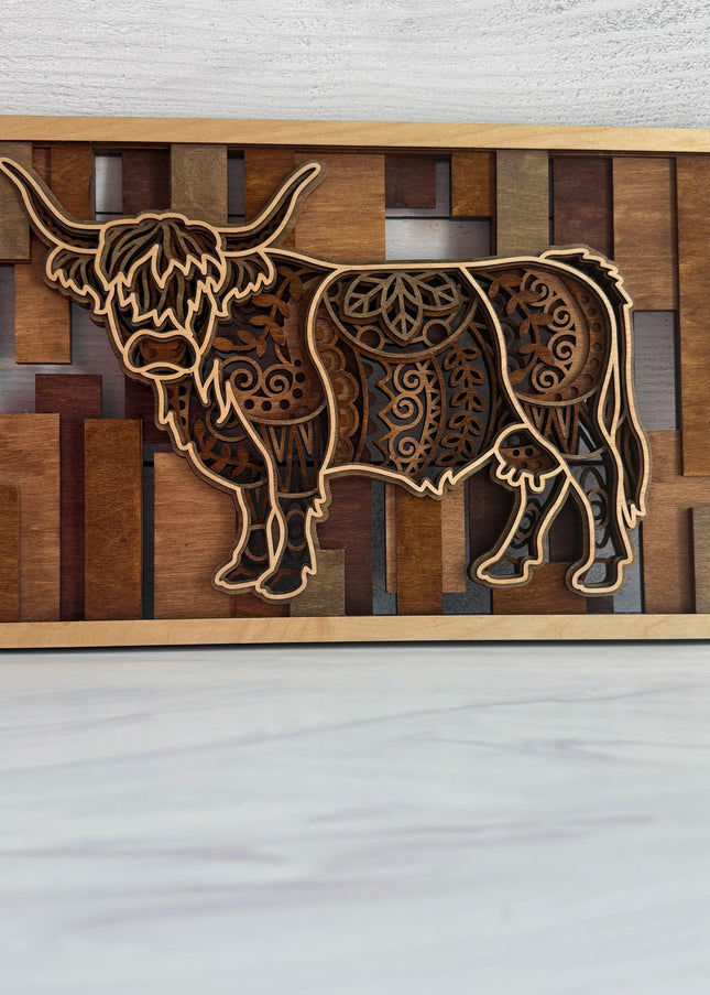 Hero shot of the highland cow in 5 layers with multiple brown tones. 