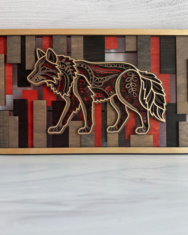 Wolf layered wood wall art front view showing mandala wolf design in Cactus Bloom and Midnight Mesa stained plywood with geometric rectangular mosaic background
