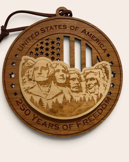 Front view of Mount Rushmore 250 Years of Freedom laser cut wood ornament showing four presidents carved into mountain design