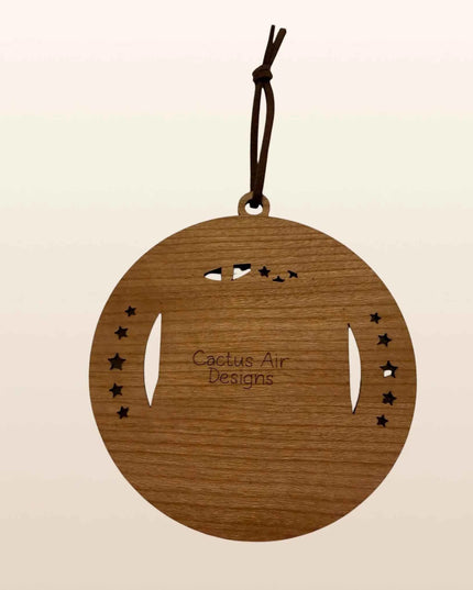 Back of Route 66 USA 250th anniversary wood ornament showing cherry plywood layer and Cactus Air Designs branding
