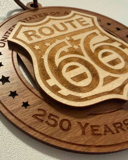 Detail view of Route 66 250 Years of Freedom laser cut wood ornament with iconic highway shield design
