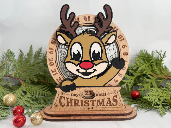 Laser-cut wooden reindeer Christmas countdown with rotating number wheel.