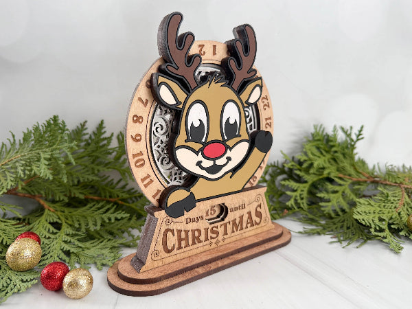 Laser-cut wooden reindeer Christmas countdown with rotating number wheel.