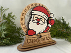Hand-painted wooden Santa Christmas countdown decoration with engraved details