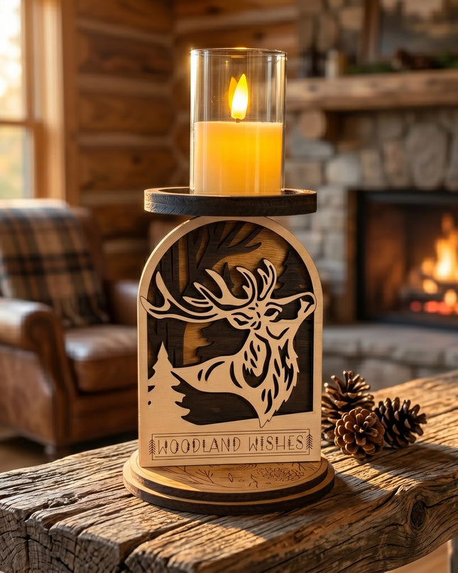 A rustic stag deer wooden candle holder with a laser-cut deer design and the words 'WOODLAND WISHES' on the front, holding a LED yellow candle in a glass holder, set on a wooden table in a cozy log cabin living room.