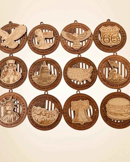 Full collection of 12 USA 250th Anniversary laser cut wood ornaments showing all designs including eagle, Liberty Bell, Mount Rushmore, Statue of Liberty, Uncle Sam, Capitol Building, Route 66, Moon Landing, Iwo Jima, USA map, Liberty Bell, and cheeseburger