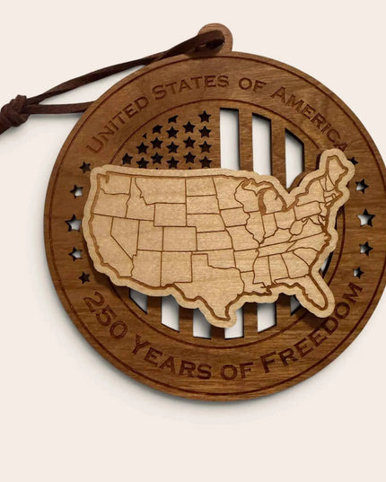 Front view of USA Map 250 Years of Freedom laser cut wood ornament showing continental United States outline against flag background