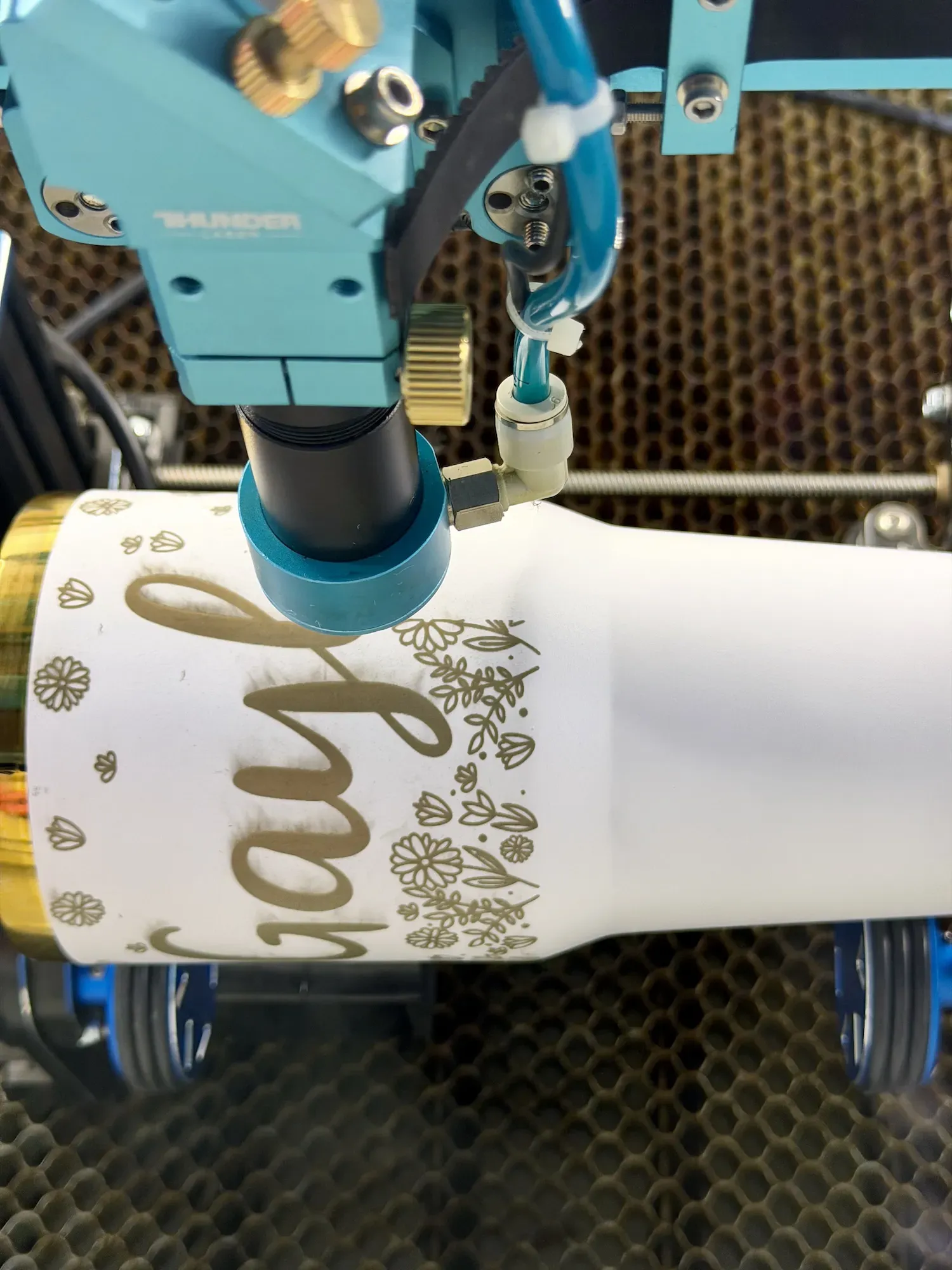 Dusty Rose Engraving Custom Tumbler • Cactus Air Designs Electroplated tumbler being laser engraved at Cactus Air Designs studio in Arizona