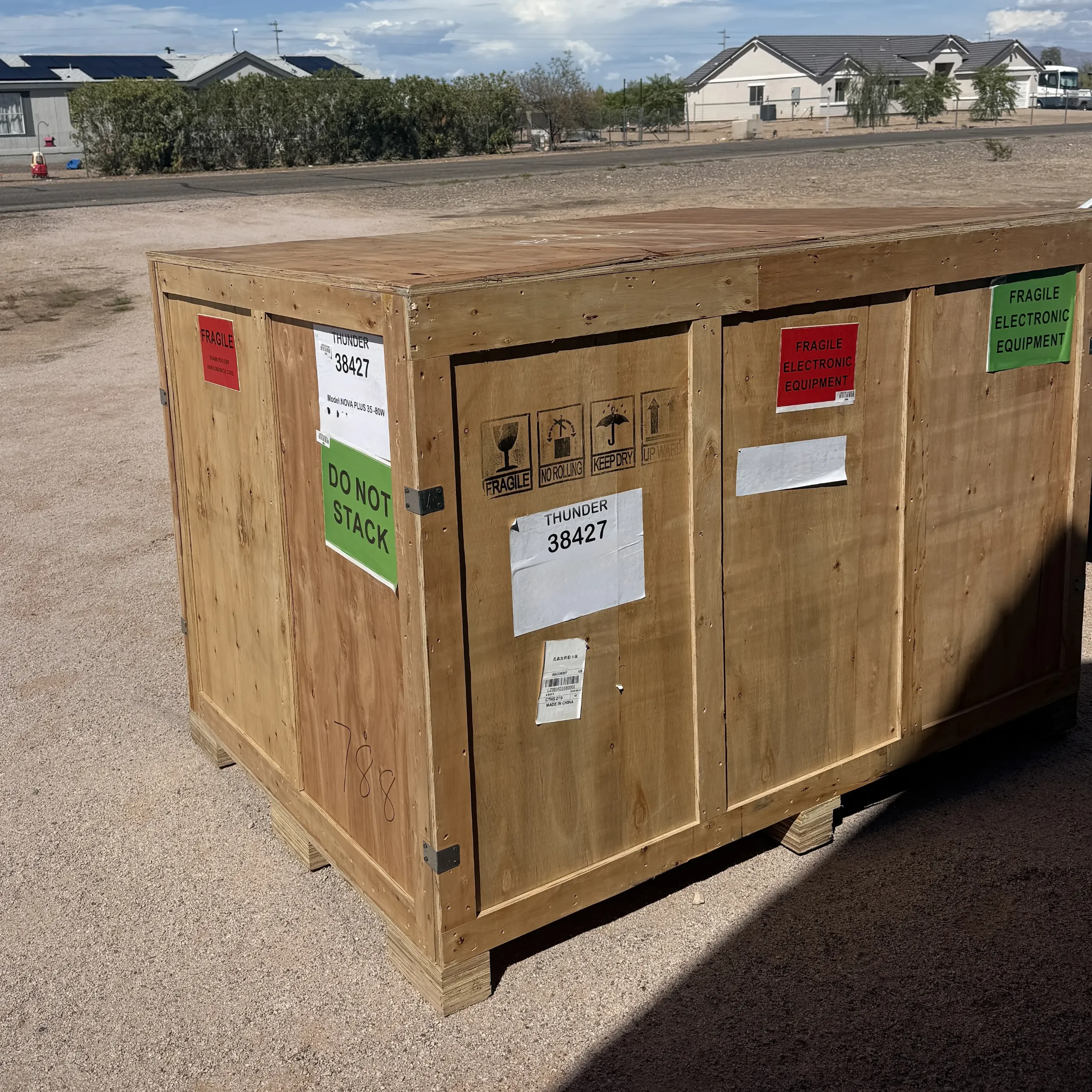 Dusty Rose laser engraver arriving at Cactus Air Designs