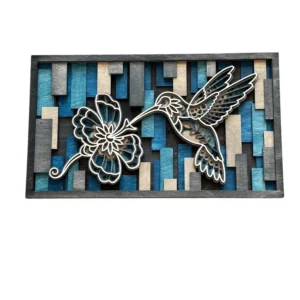 Front view of six-layer hummingbird layered wood wall art made with maple premium plywood with a geometric background in cool desert colors with an all white background.
