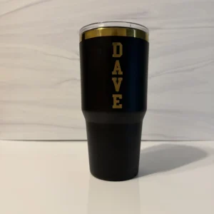 Black and gold Dad Legend tumbler personalized with Dave in vertical block lettering