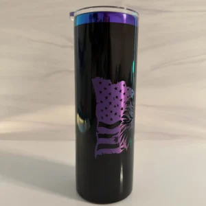 Full view of patriotic eagle engraved tumbler that is black electroplated 20 oz skinny tumbler. It has a American flag and eagle engraved and has a holographic metal under the black.
