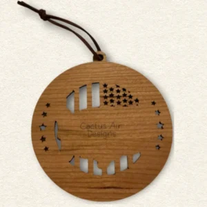 Back of the round wooden ornament showing the natural wood grain, an attached brown hanging cord, and “Cactus Air Designs” laser engraved in a delicate single-line font.
