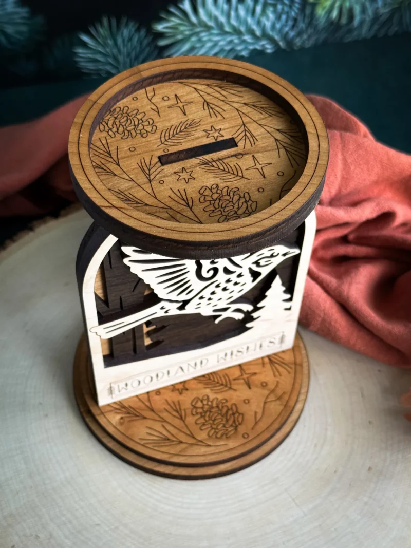 Cardinal woodland candle holder used to show the exposed tab option on the engraved candle platform