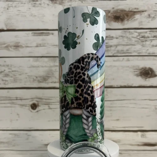 20 oz White Shimmer skinny tumbler with braided pigtail gnome, green plaid bow and leopard print hat.