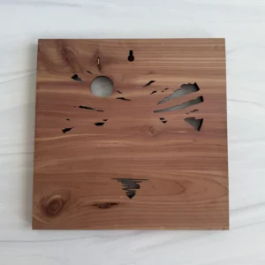 Aromatic cedar back with keyhole hanging opening and landscape cutouts