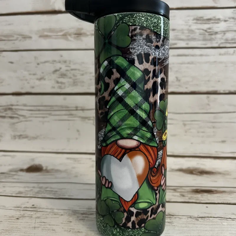 Plaid-hat gnome holding a green, white, and orange heart