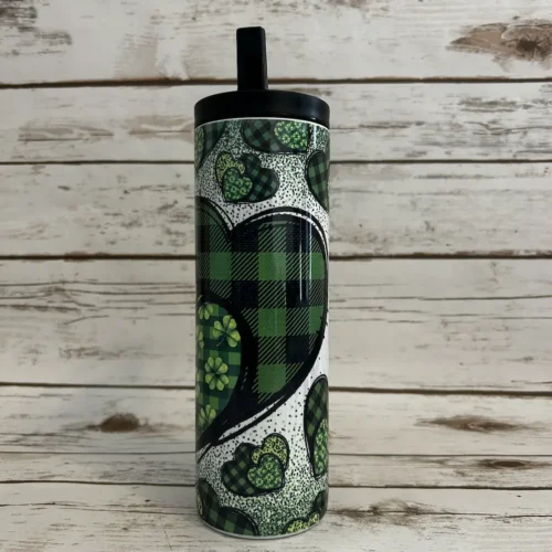 st patricks day gorgeous green heart tumbler that has green buffalo plaid with a sublimated design on a 20oz skinny